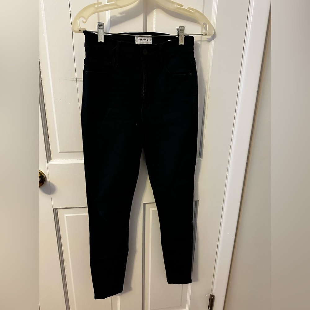Women’s high-rise black denim skinny jeans. By frame. Size 27.